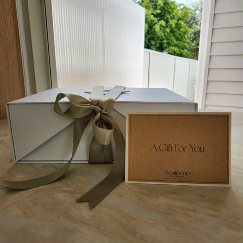 Origami-style reusable white gift box packaging for the Summer Time hamper.